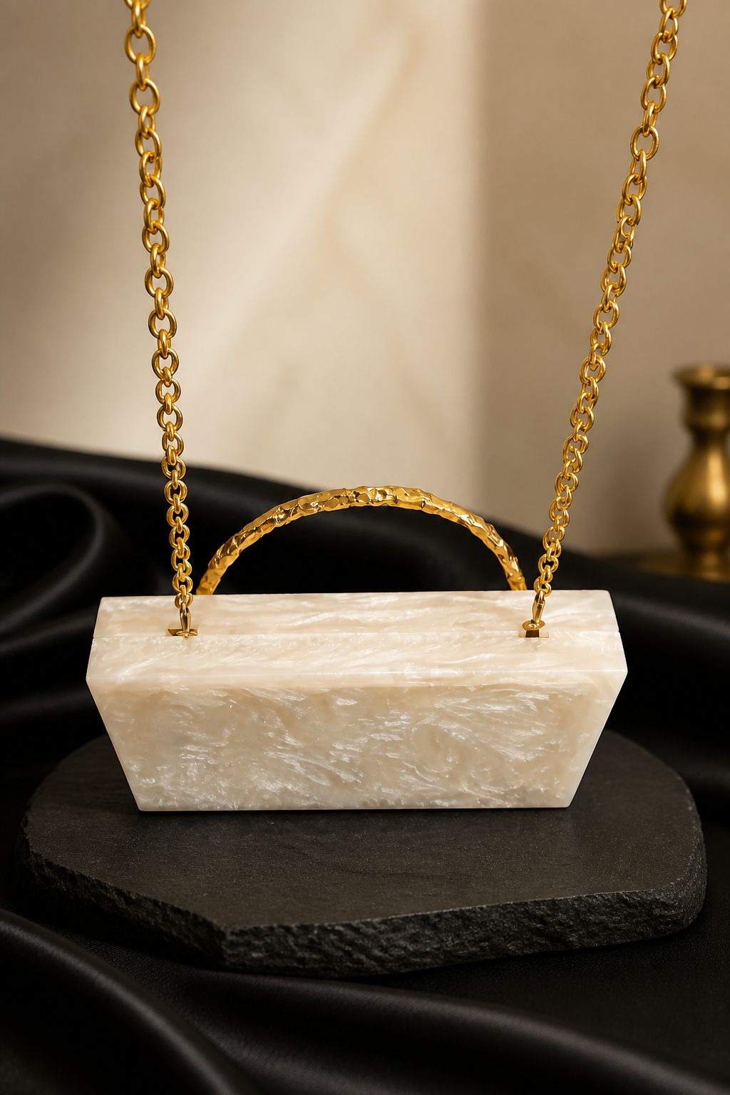 Luxury crystal bunch handle bag with pearl and crystal embellished gold handle and marble finish clutch body