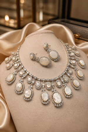 Luxury mother of pearl necklace with sparkling AD detailing and matching earrings in elegant statement jewellery style