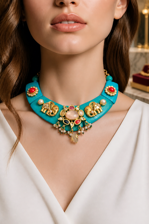 Designer resin necklace with jadau pieces, elephant motifs, kundan detailing, and colourful ethnic stone accents