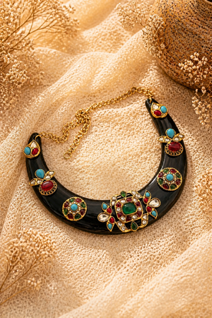 Designer acrylic necklace with colourful jadau pieces and traditional ethnic detailing in statement jewellery style