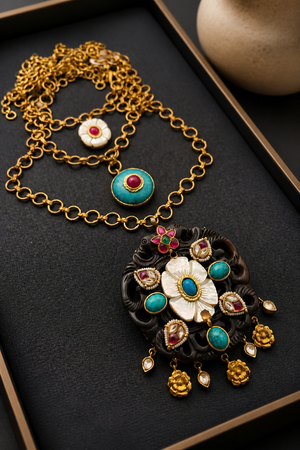 Handcrafted wooden base necklace with mother of pearl floral detailing, turquoise accents, and artistic ethnic statement design