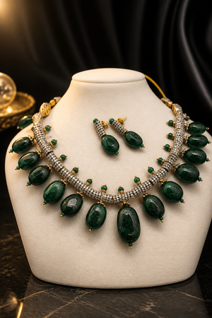 Luxury green tumble stone necklace with sparkling AD detailing and matching earrings in statement ethnic jewellery style