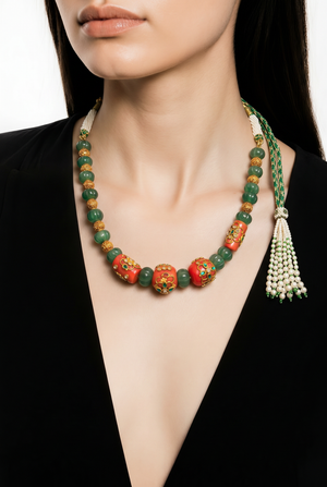 Handcrafted green carved beads and coral necklace with intricate jadau work and traditional ethnic detailing