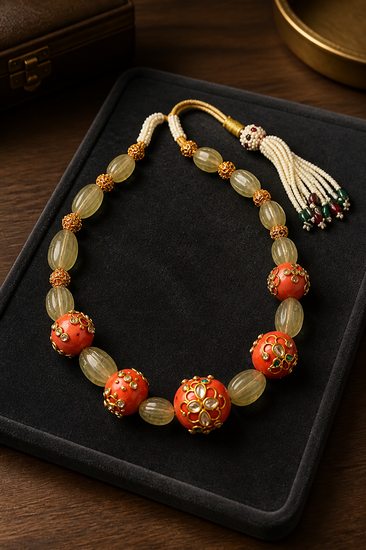 Luxury carved jade stone and coral necklace with intricate jadau work and handcrafted ethnic detailing