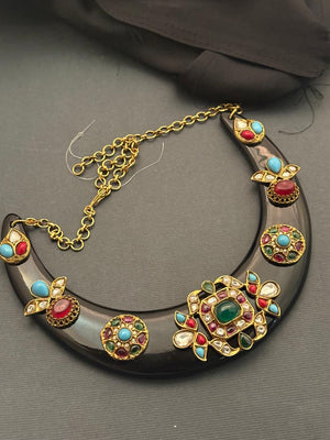 Designer acrylic necklace with colourful jadau pieces and traditional ethnic detailing in statement jewellery style