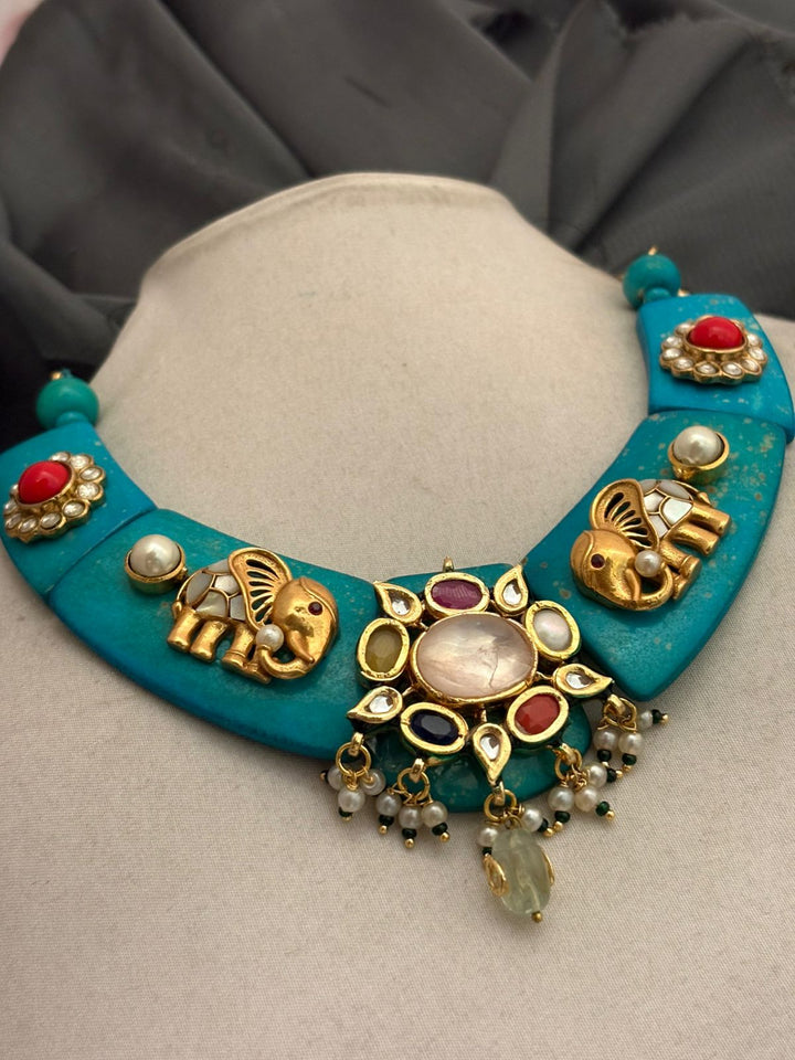 Designer resin necklace with jadau pieces, elephant motifs, kundan detailing, and colourful ethnic stone accents
