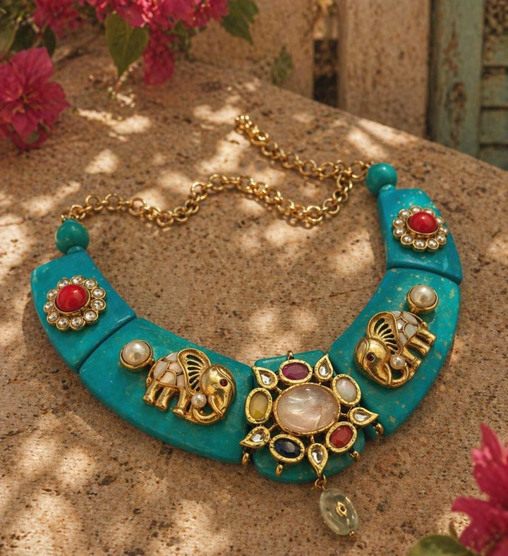 Designer resin necklace with jadau pieces, elephant motifs, kundan detailing, and colourful ethnic stone accents