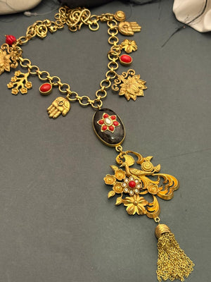 Designer charms style necklace with coral detailing and tassel pendant in traditional ethnic jewellery style