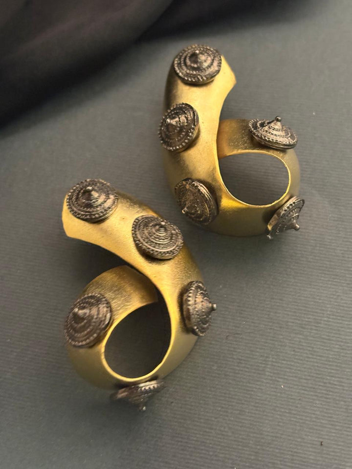 Contemporary gold earrings with elegant two tone polish and designer detailing for ethnic wear