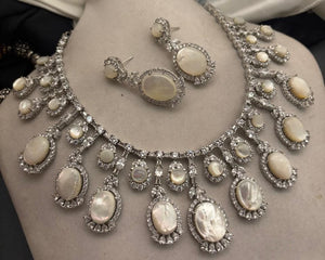 Luxury mother of pearl necklace with sparkling AD detailing and matching earrings in elegant statement jewellery style
