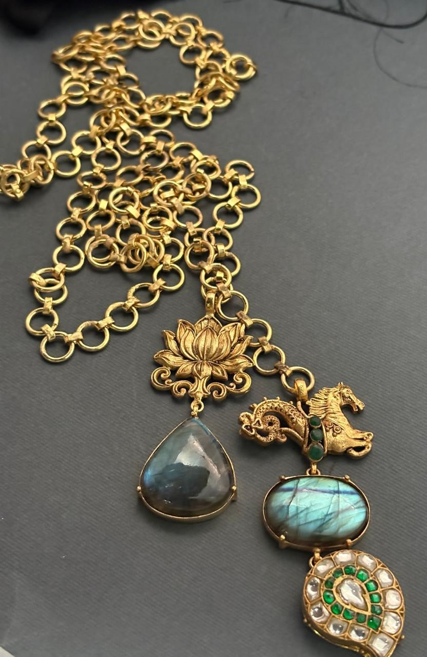 Designer wrap around necklace with labradorite stones and intricate gold motifs in artistic ethnic style