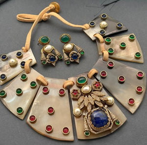 Resin necklace with coloured stones and AD pieces
