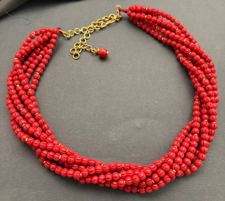 Elegant multi strand small coral beads necklace with handcrafted ethnic statement design
