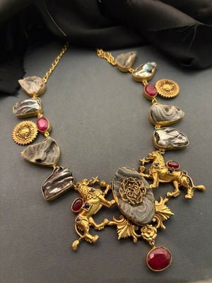 Luxury lion motif necklace with natural agate stones, ruby accents, and intricate handcrafted ethnic detailing