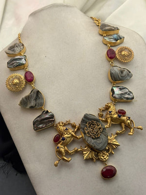 Luxury lion motif necklace with natural agate stones, ruby accents, and intricate handcrafted ethnic detailing