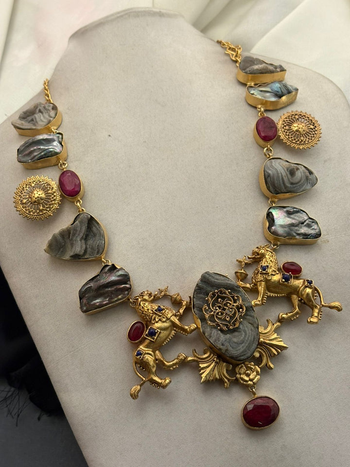 Luxury lion motif necklace with natural agate stones, ruby accents, and intricate handcrafted ethnic detailing