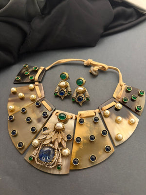 Resin necklace with coloured stones and AD pieces