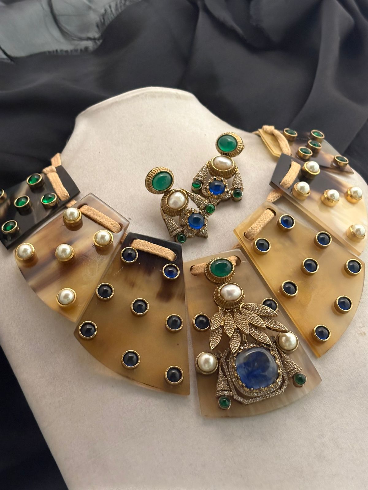 Resin necklace with coloured stones and AD pieces