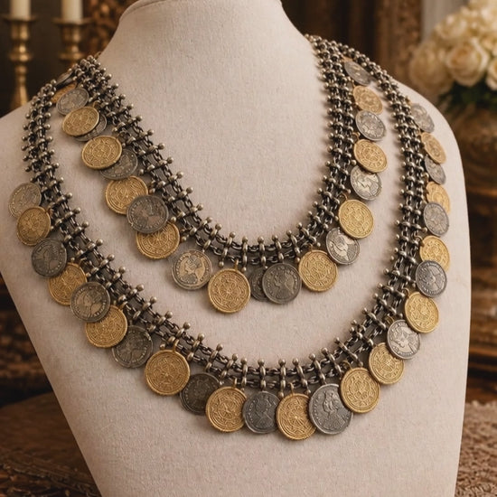 Vintage two tone layered coin necklace with antique metallic detailing and statement ethnic design