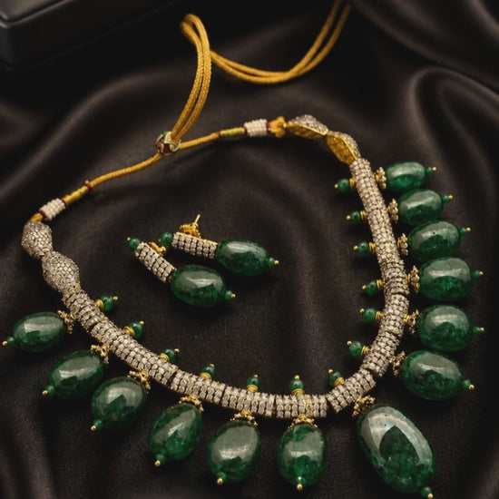 Luxury green tumble stone necklace with sparkling AD detailing and matching earrings in statement ethnic jewellery style