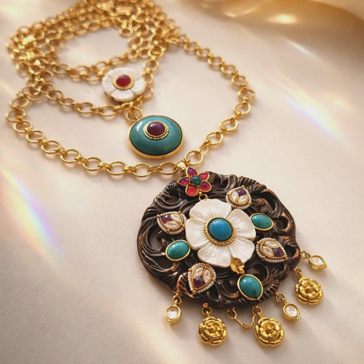 Handcrafted wooden base necklace with mother of pearl floral detailing, turquoise accents, and artistic ethnic statement design