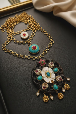 Handcrafted wooden base necklace with mother of pearl floral detailing, turquoise accents, and artistic ethnic statement design