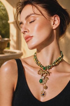 Designer lion motif necklace with kundan crystal detailing and greenish turquoise bead strands in traditional ethnic jewellery style