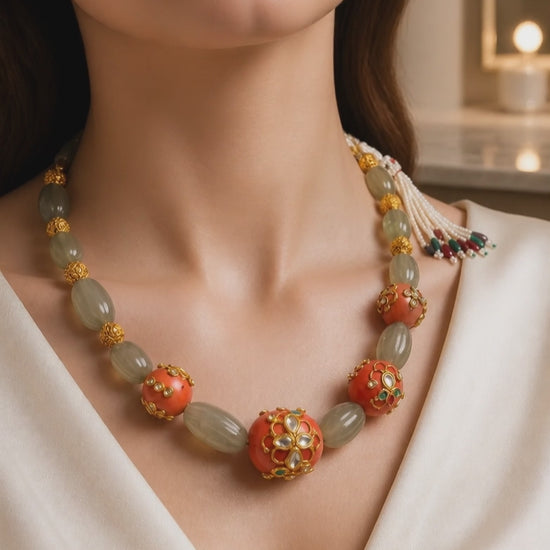 Luxury carved jade stone and coral necklace with intricate jadau work and handcrafted ethnic detailing