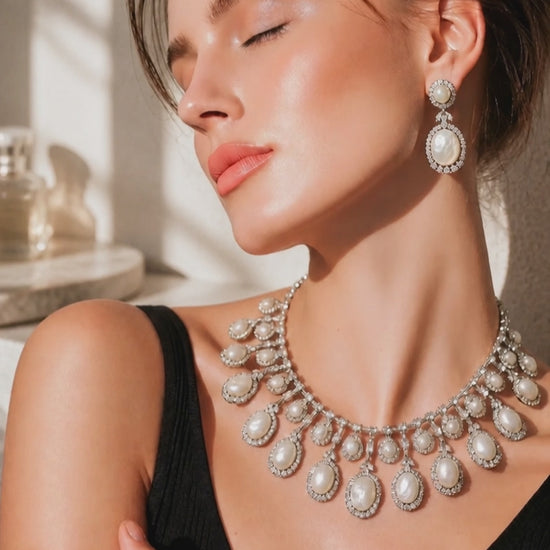 Luxury mother of pearl necklace with sparkling AD detailing and matching earrings in elegant statement jewellery style