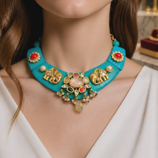 Designer resin necklace with jadau pieces, elephant motifs, kundan detailing, and colourful ethnic stone accents