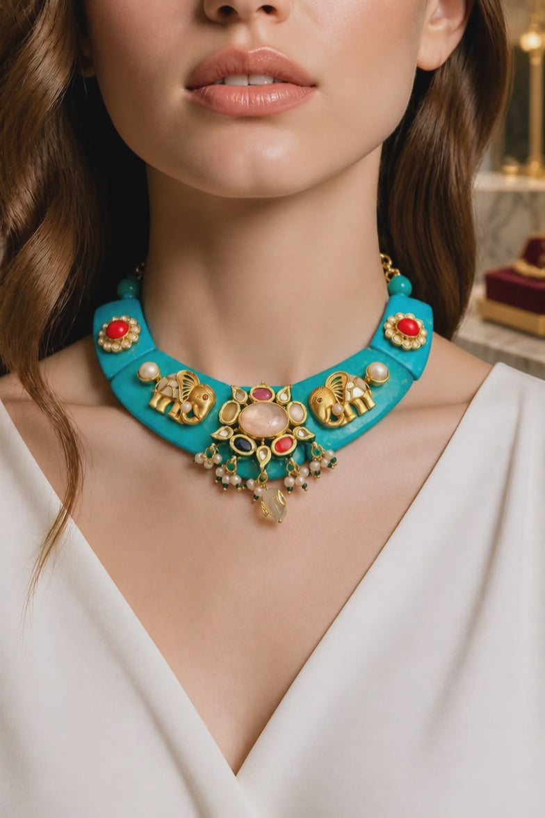 Designer resin necklace with jadau pieces, elephant motifs, kundan detailing, and colourful ethnic stone accents