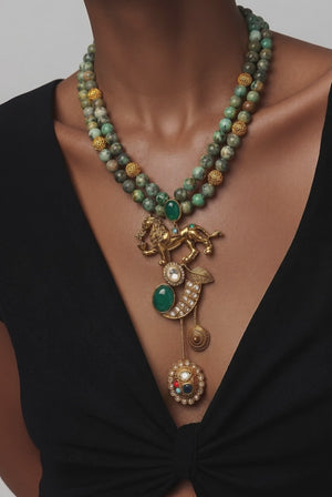 Designer lion motif necklace with kundan crystal detailing and greenish turquoise bead strands in traditional ethnic jewellery style