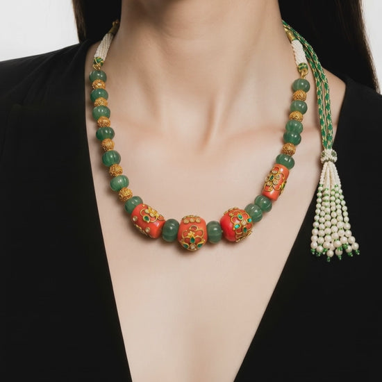 Handcrafted green carved beads and coral necklace with intricate jadau work and traditional ethnic detailing