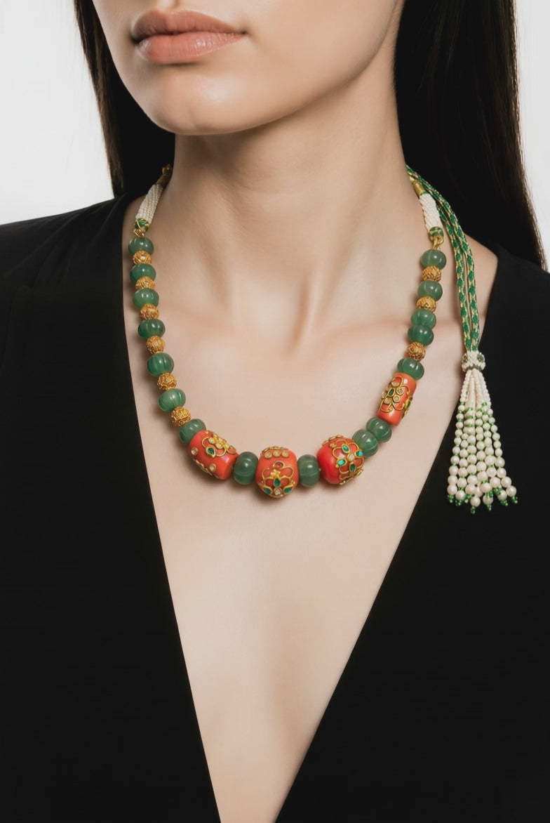 Handcrafted green carved beads and coral necklace with intricate jadau work and traditional ethnic detailing