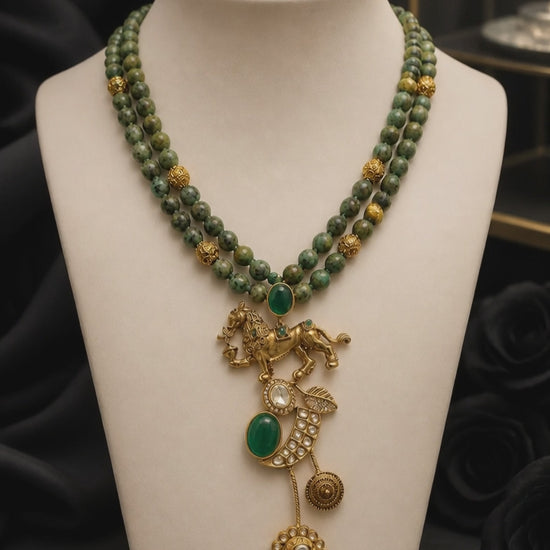 Designer lion motif necklace with kundan crystal detailing and greenish turquoise bead strands in traditional ethnic jewellery style