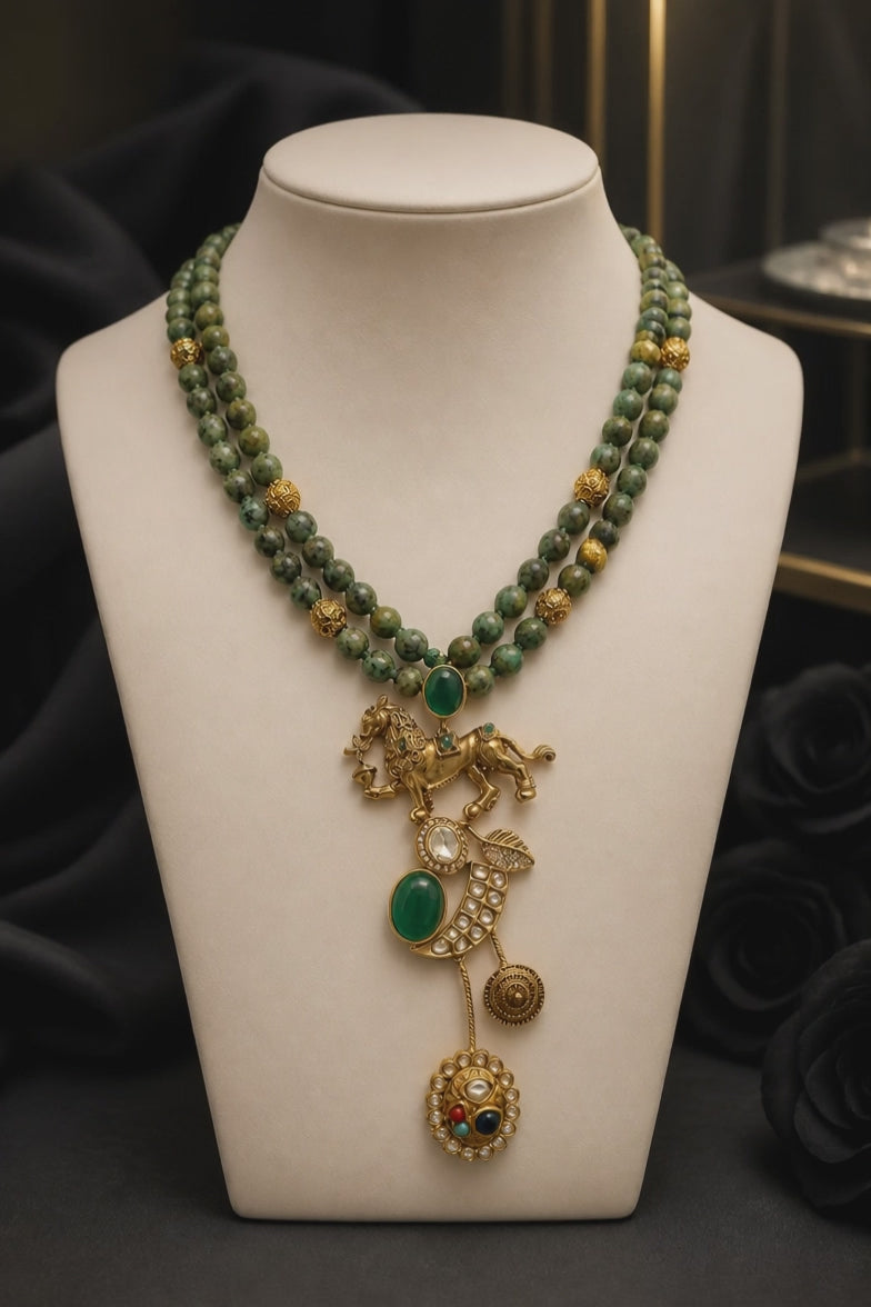 Designer lion motif necklace with kundan crystal detailing and greenish turquoise bead strands in traditional ethnic jewellery style