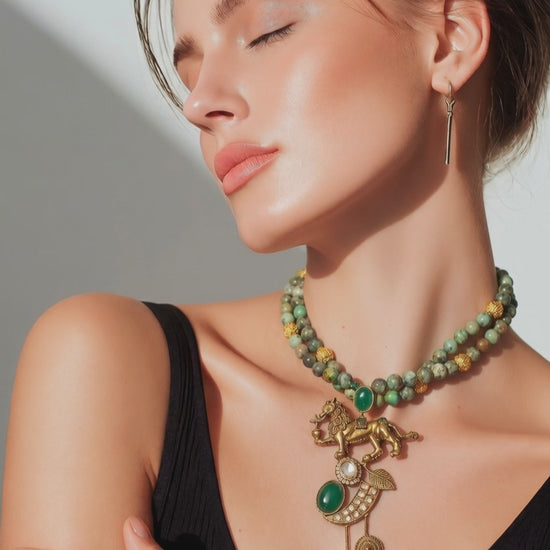 Designer lion motif necklace with kundan crystal detailing and greenish turquoise bead strands in traditional ethnic jewellery style