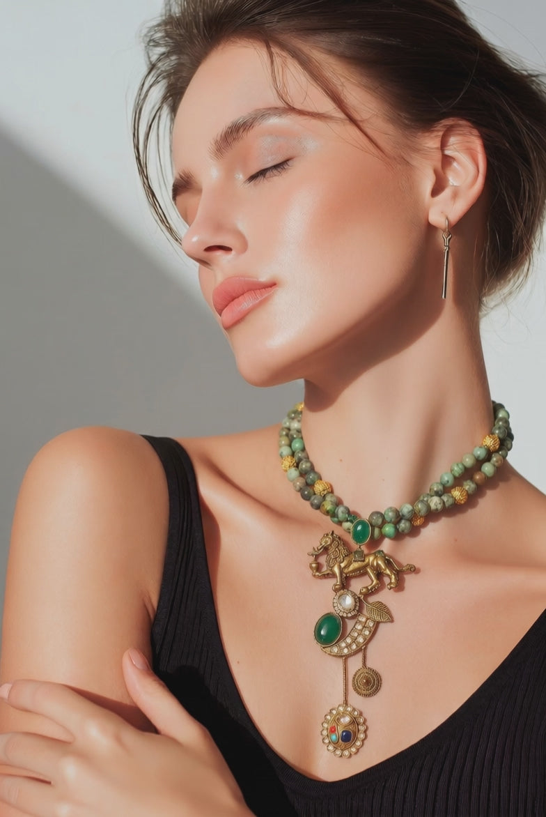 Designer lion motif necklace with kundan crystal detailing and greenish turquoise bead strands in traditional ethnic jewellery style
