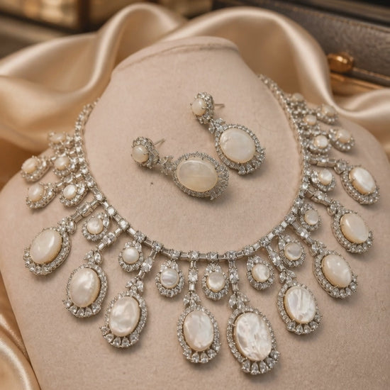 Luxury mother of pearl necklace with sparkling AD detailing and matching earrings in elegant statement jewellery style