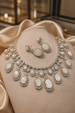Luxury mother of pearl necklace with sparkling AD detailing and matching earrings in elegant statement jewellery style