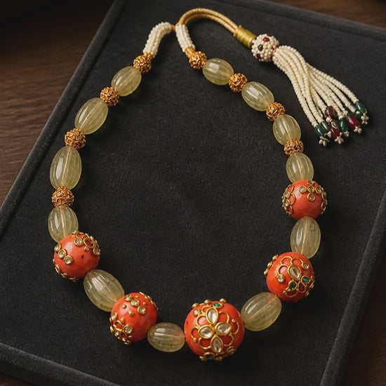 Luxury carved jade stone and coral necklace with intricate jadau work and handcrafted ethnic detailing
