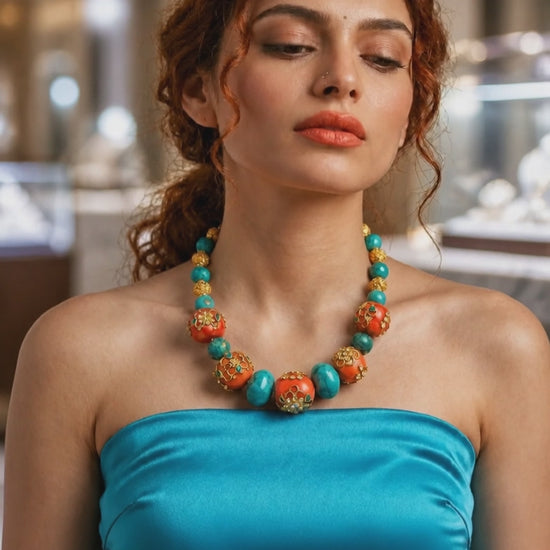 Handcrafted turquoise and coral necklace with intricate jadau work and traditional ethnic designer detailing