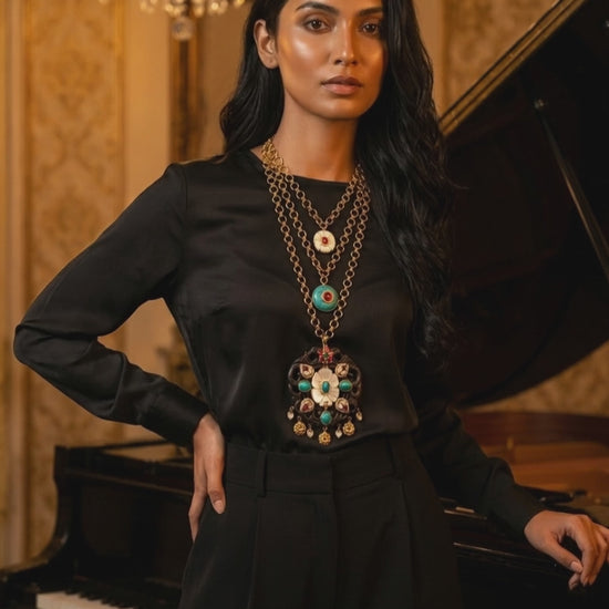 Handcrafted wooden base necklace with mother of pearl floral detailing, turquoise accents, and artistic ethnic statement design