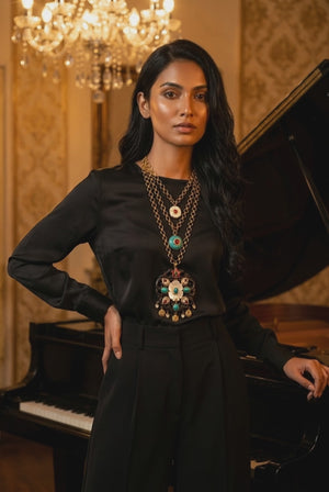 Handcrafted wooden base necklace with mother of pearl floral detailing, turquoise accents, and artistic ethnic statement design