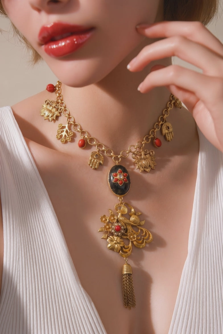 Designer charms style necklace with coral detailing and tassel pendant in traditional ethnic jewellery style